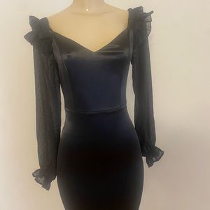 Black long sleeve dress with sheer sleeves formfitting new with tag